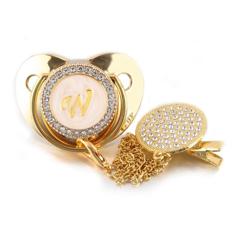 Chupeta Dourada BIBIA™ + Prendedor Strass